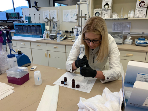 Lab specialist checking for cyanotoxins