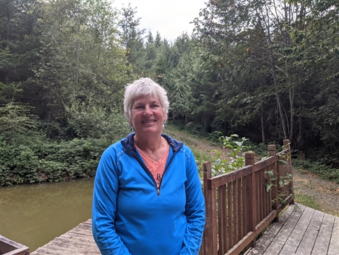 Sue Zeni on her property near Walterville