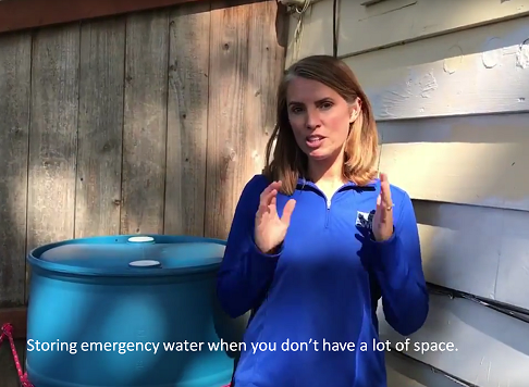 video thumbnail picture of a woman standing near a water storage barrel