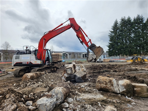 Construction digging up foundation