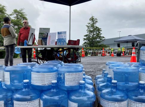 A pile of empty emergency water containers 