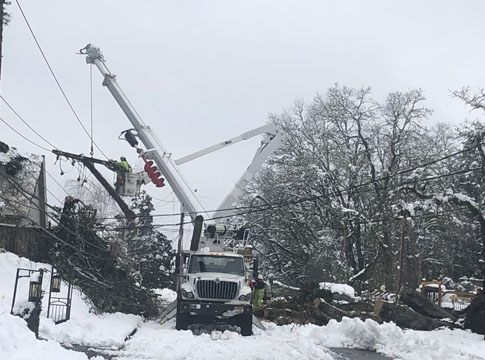 EWEB line crews repair damaged lines after snow storm damages system