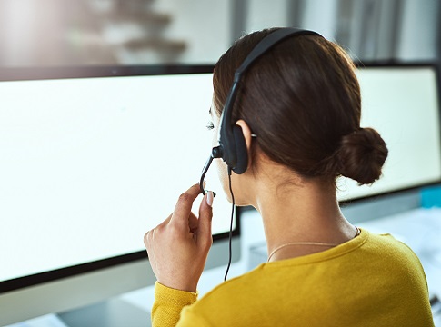 Rearview picture of customer service agent talking on the phone