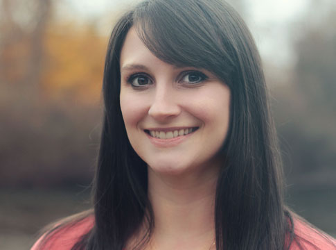 Portrait photo of Leah in front of river