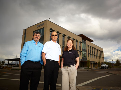 Northwest Community Credit Union staff outside building