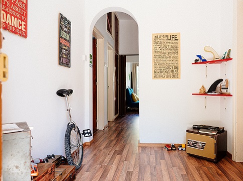 Picture of a bicycle parked indoor in a hallway