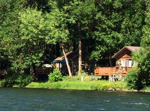 Two houses by the river