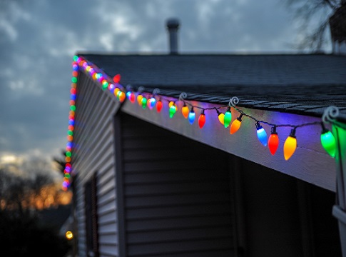 House will colorful holiday light decorations