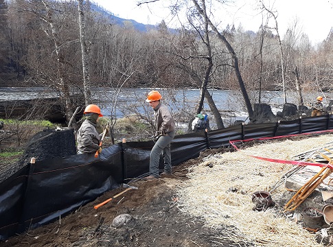 Northwest Youth Corps crews install sediment fences on properties along McKenzie River